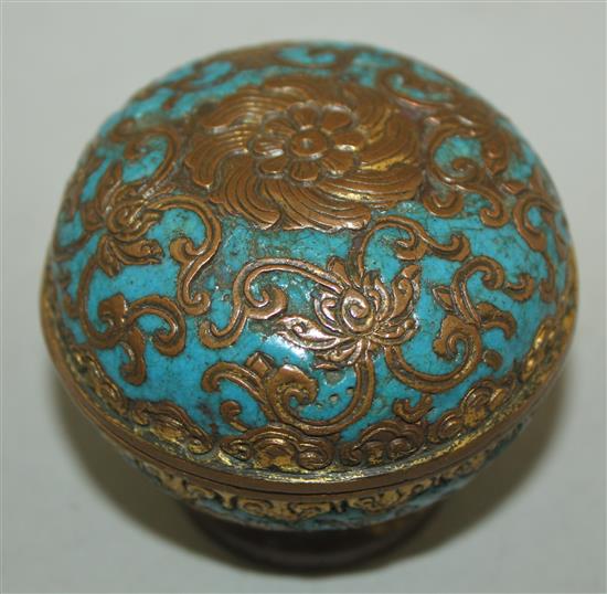 A Chinese gilt bronze and champleve enamel box and cover, 18th century, diam. 6.5cm, wear and minor losses